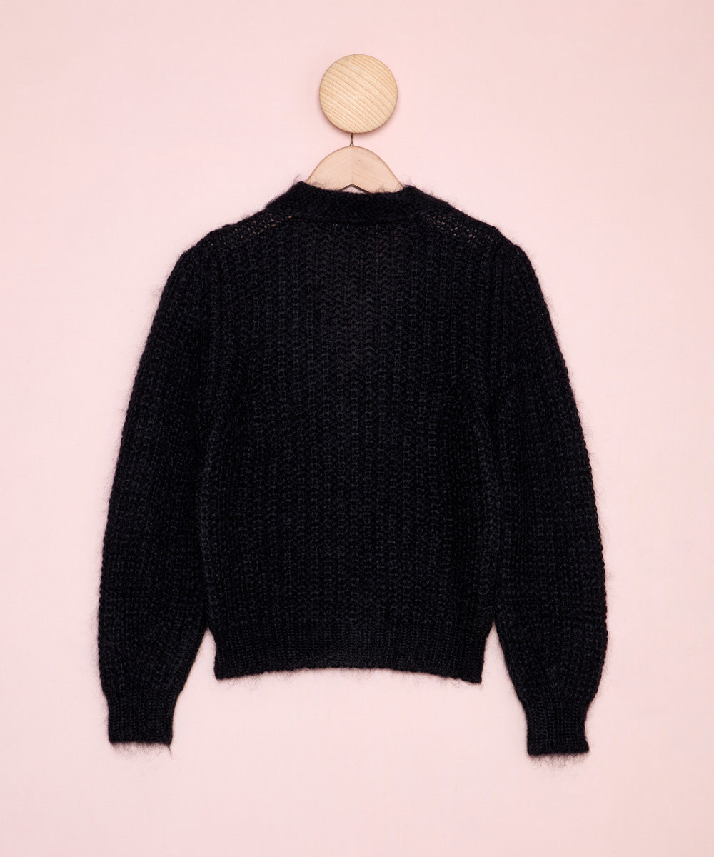 Imagen de la espalda de una chaqueta de Masscob tejida en mezcla de mohair. La Folie Santander.